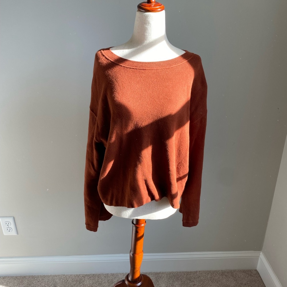 Orange, oversized sweater.